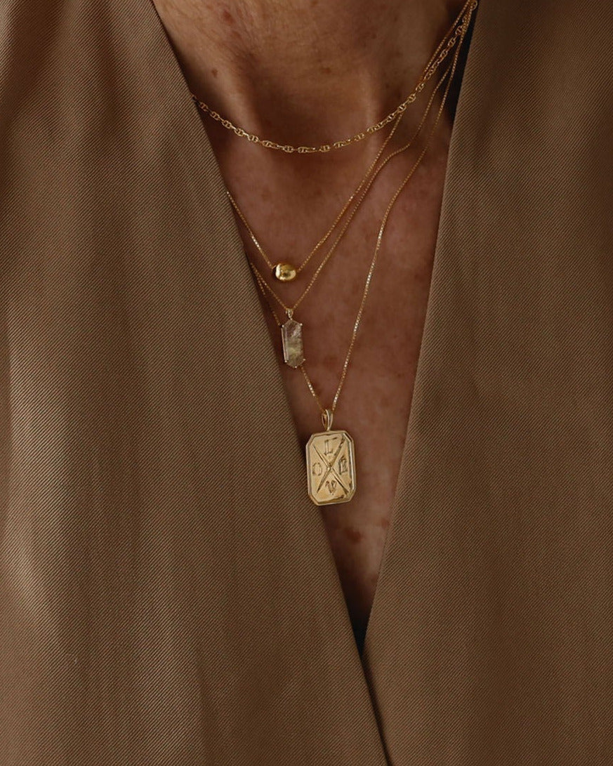 gold layers of necklaces