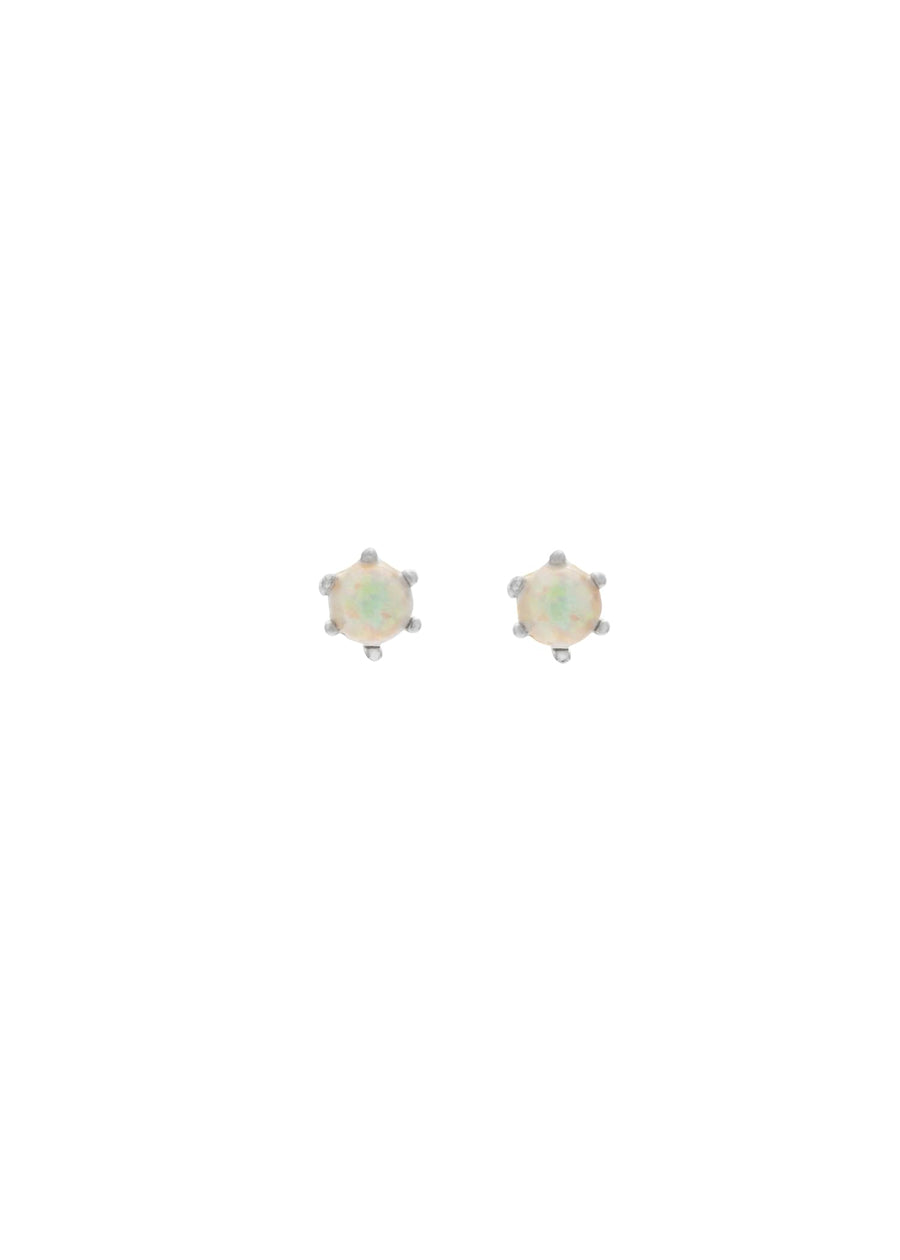 Pair of opal stud earrings on a white background