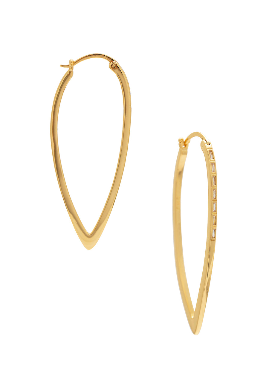 Gold hoop earrings on a white background
