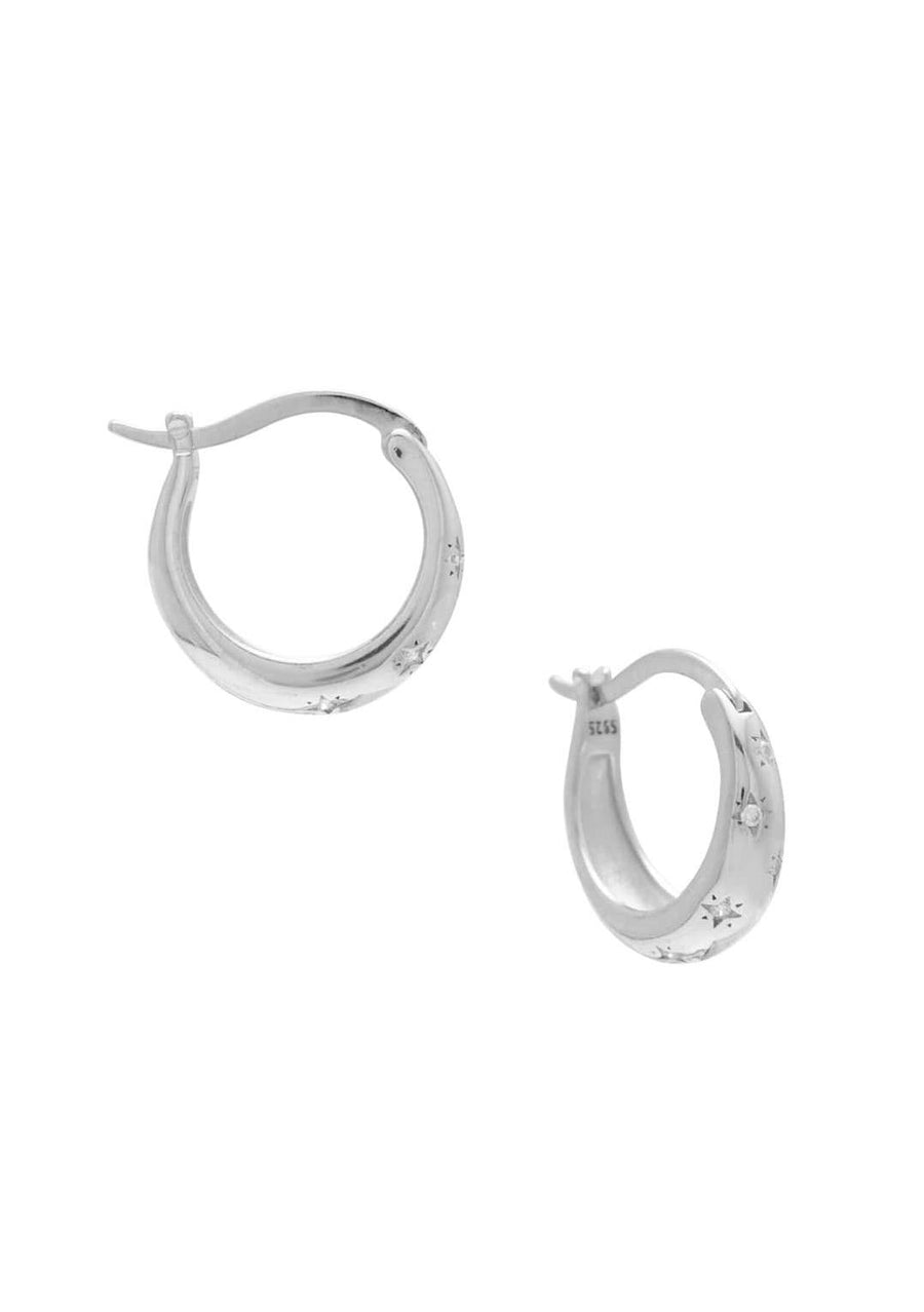 a pair of silver hoops with small etched stars