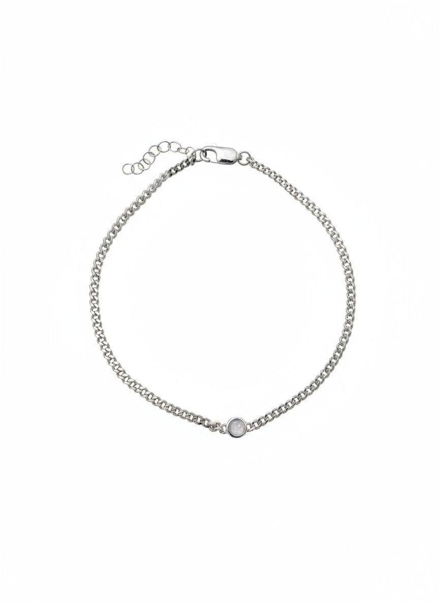 Silver chain bracelet on a white background