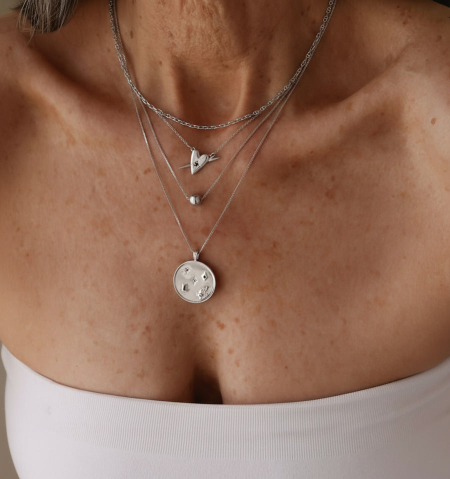 Sarah Mulder Jewelry stacked and layered silver necklaces