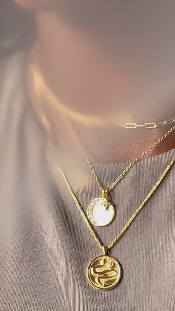 video showing 3 necklaces in gold worn on a model by Sarah Mulder Jewelry