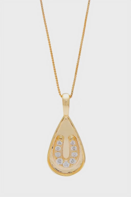 Sarah Mulder Jewelry gold horseshoe necklace on a white background