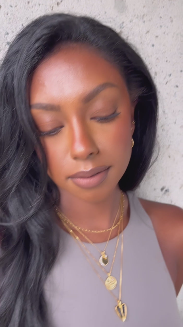 video of model wearing Sarah Mulder Jewelry earring layer
